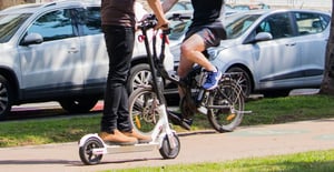 Escooter & Bicycle passing by