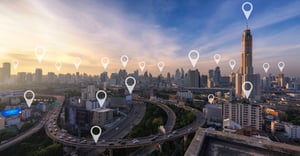 Landscape image showing location markers across a city