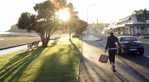 Person walking down Tamaki Drive